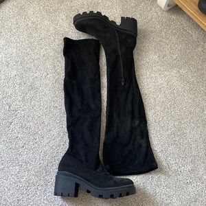 Thigh high lug sole boots